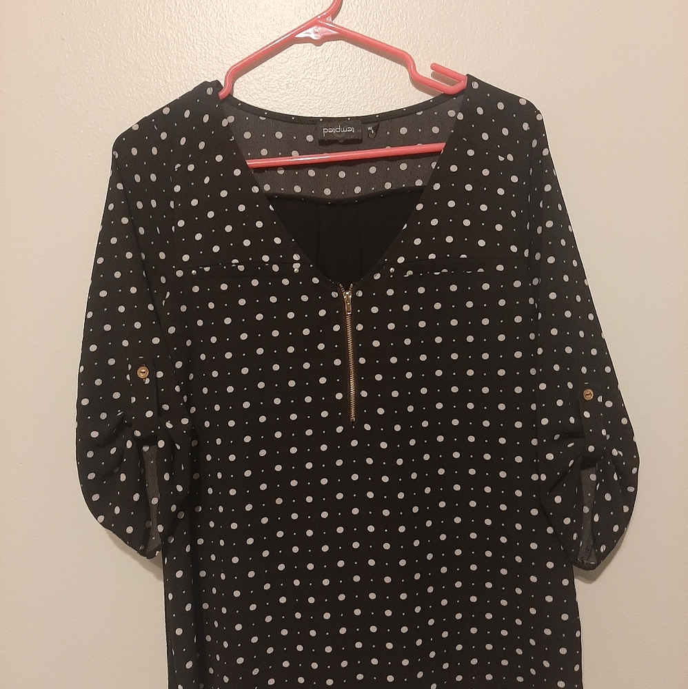 Size Medium. Tempted brand